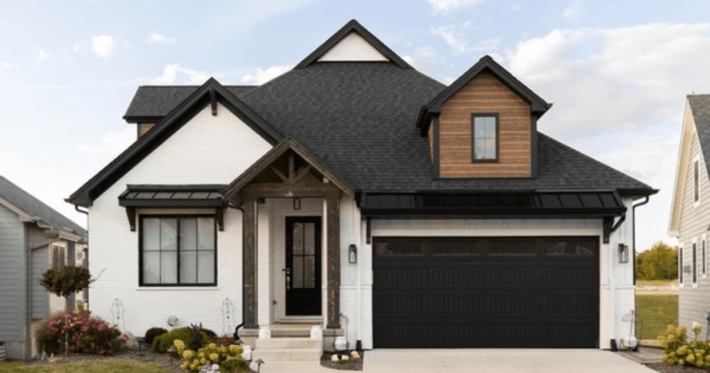 modern white house with black garage door
